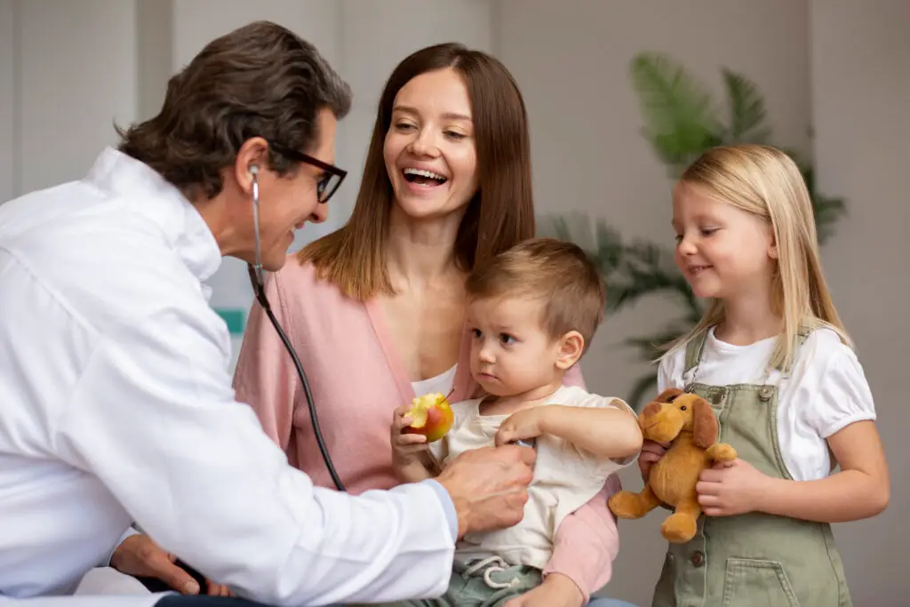 young mother with her children pediatrician appointment